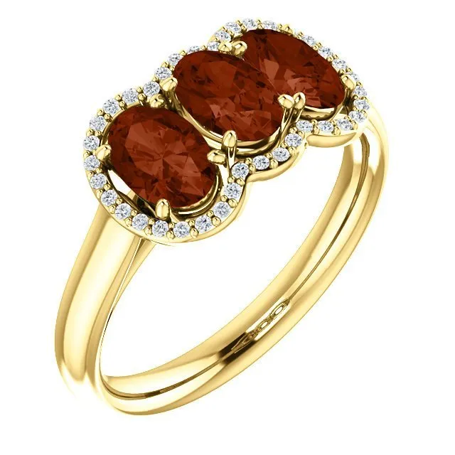 14KT GOLD 1.74 CTW GARNET & .10 CTW DIAMOND 3 STONE OVAL HALO RING