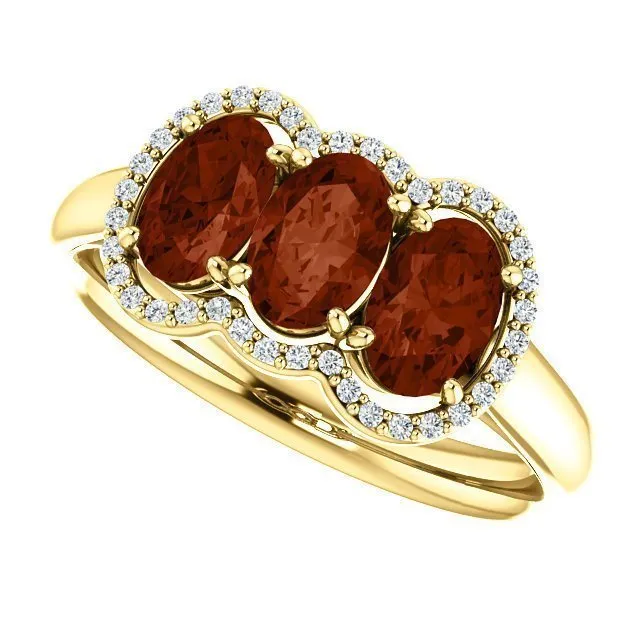 14KT GOLD 1.74 CTW GARNET & .10 CTW DIAMOND 3 STONE OVAL HALO RING