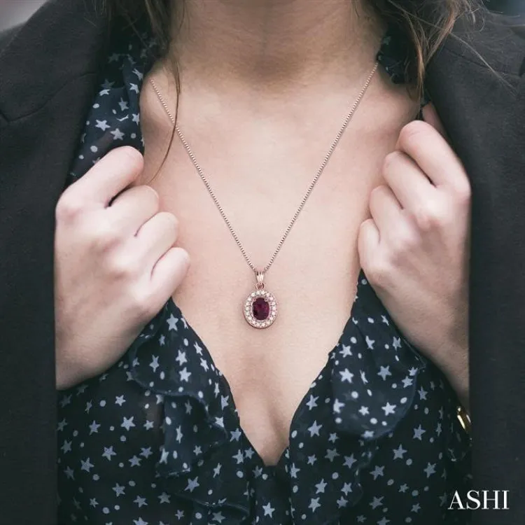 8x6mm Oval Cut Rhodolite Garnet and 1/3 Ctw Round Cut Diamond Pendant in 14K Rose Gold with Chain