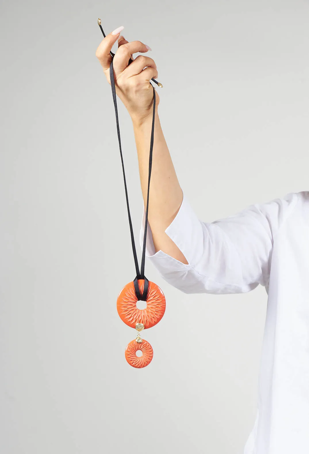 Adjustable Necklace with Ring Shaped Pendant in Coral