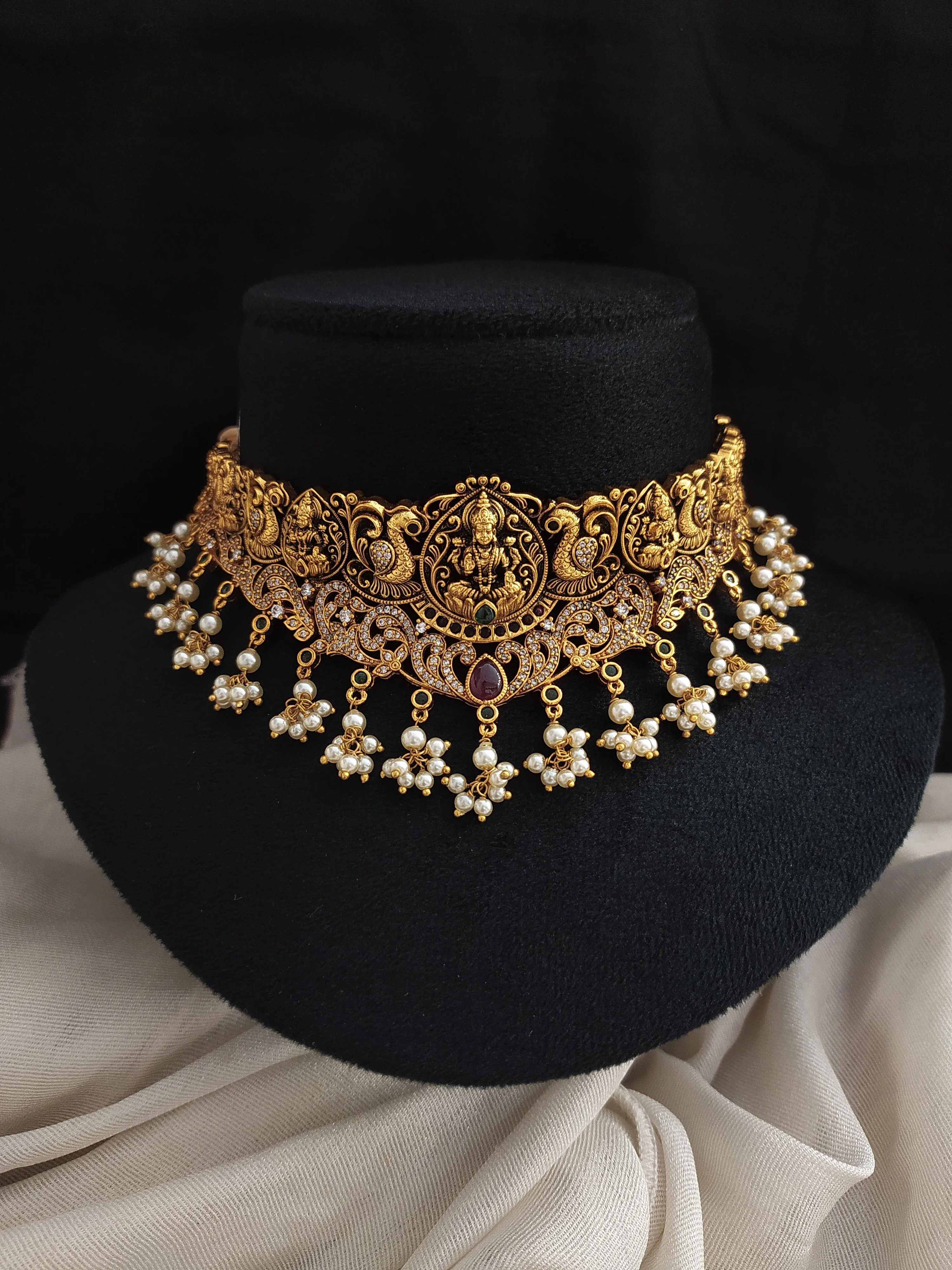 Embrace Divine Elegance With The Goddess Lakshmi Ji & Peacock Antique Choker Set