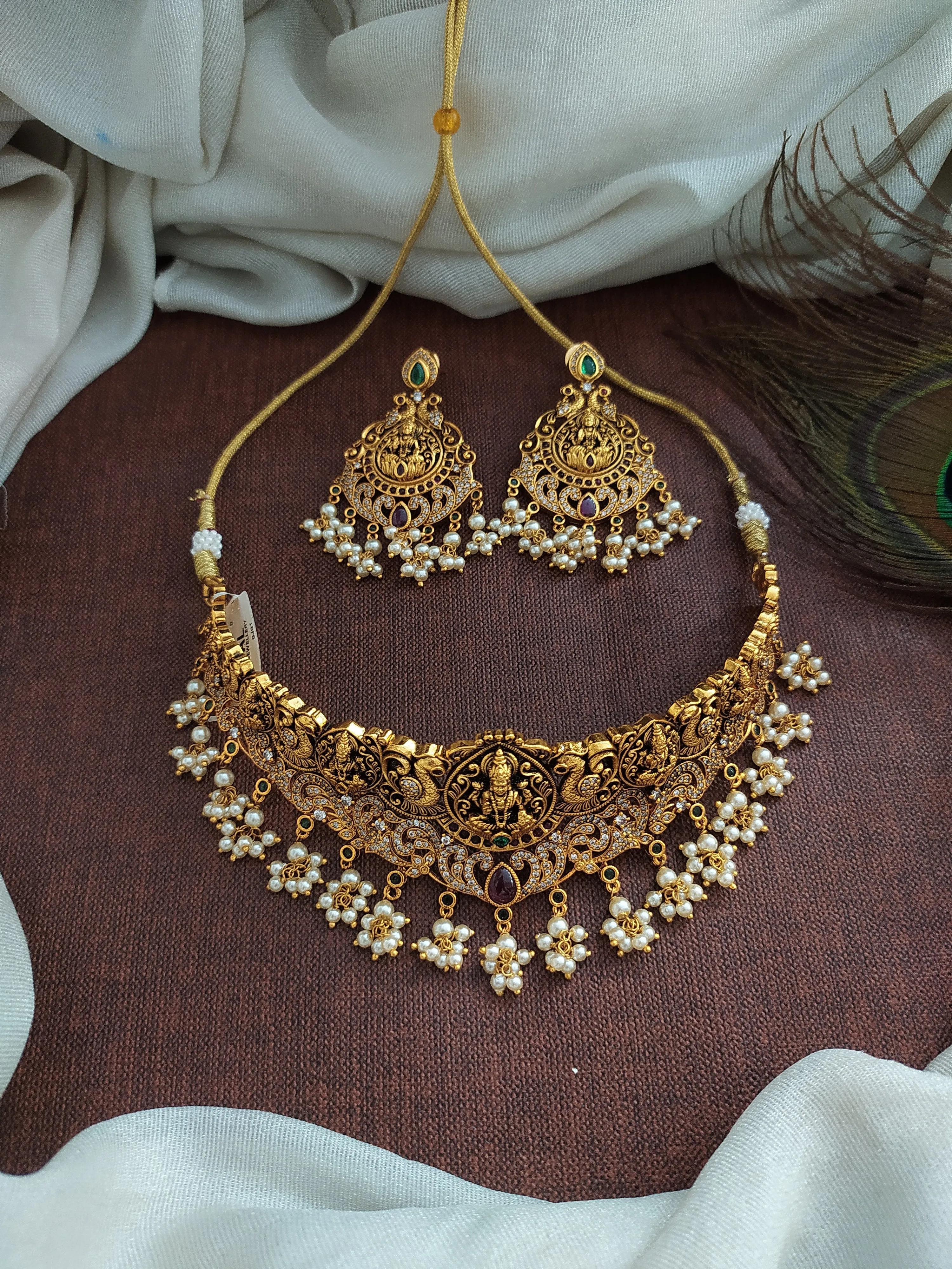 Embrace Divine Elegance With The Goddess Lakshmi Ji & Peacock Antique Choker Set