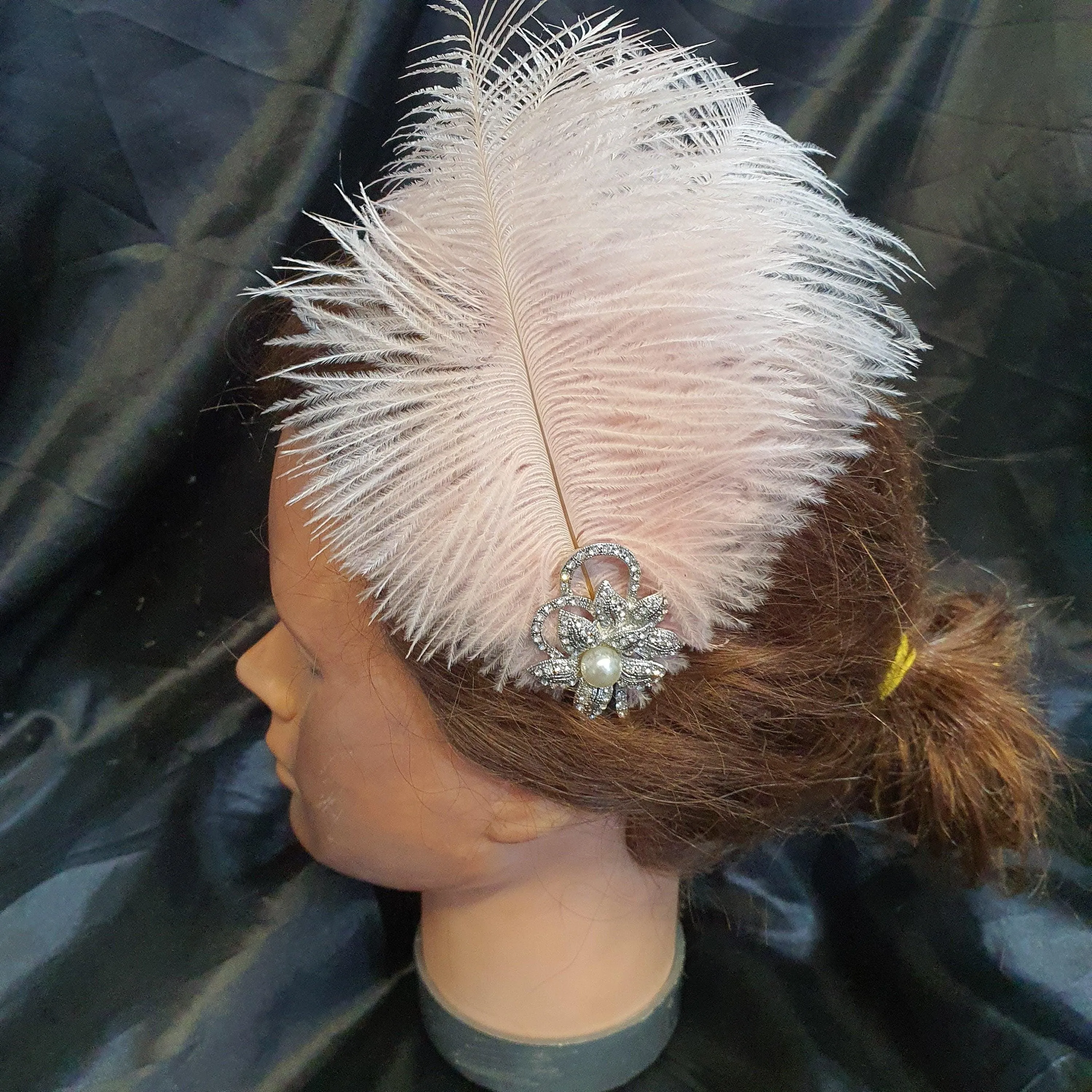 Featherheadpiece fsacinator head band , feather hair piece by Crystal wedding uk