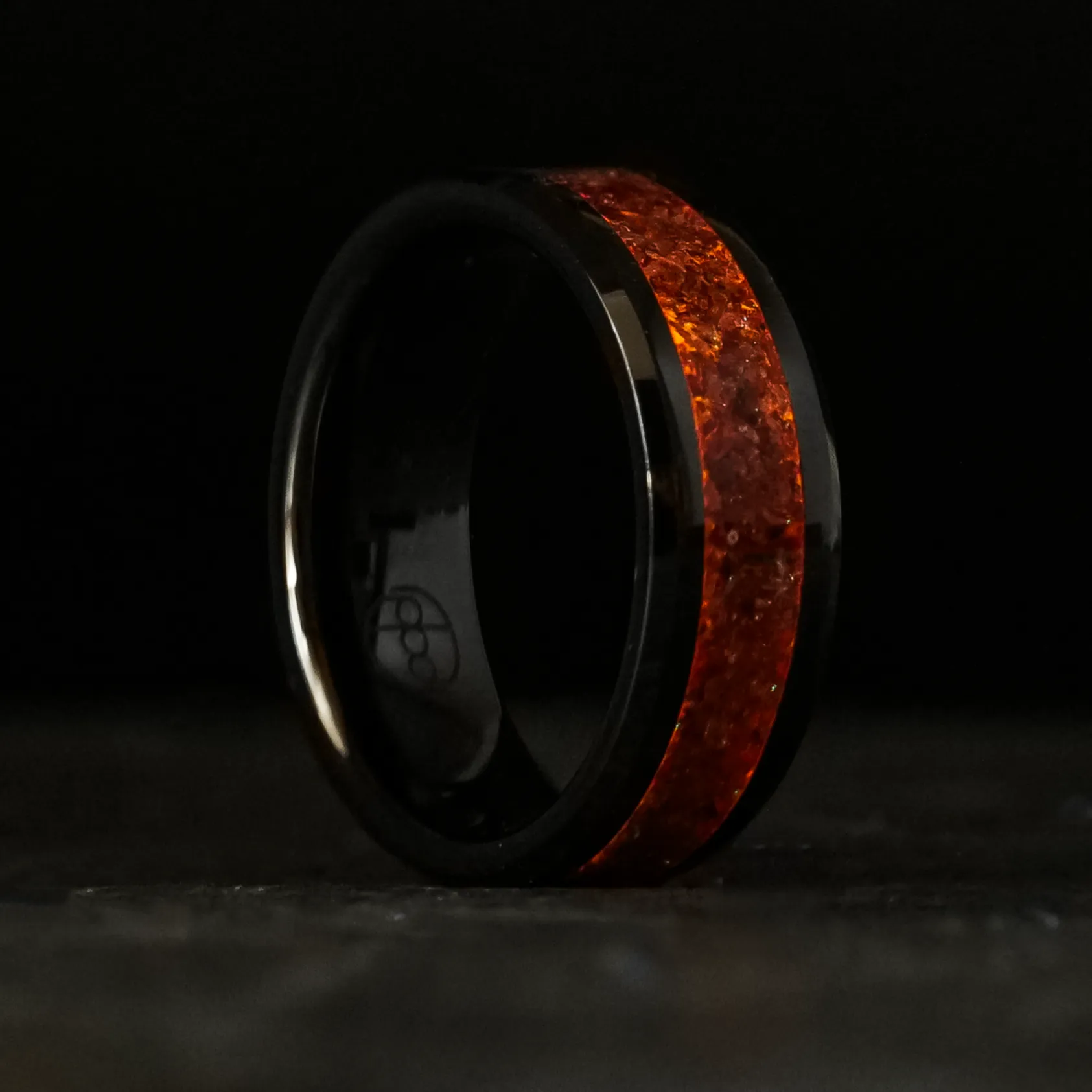 Garnet Glowstone Ring on Black Ceramic