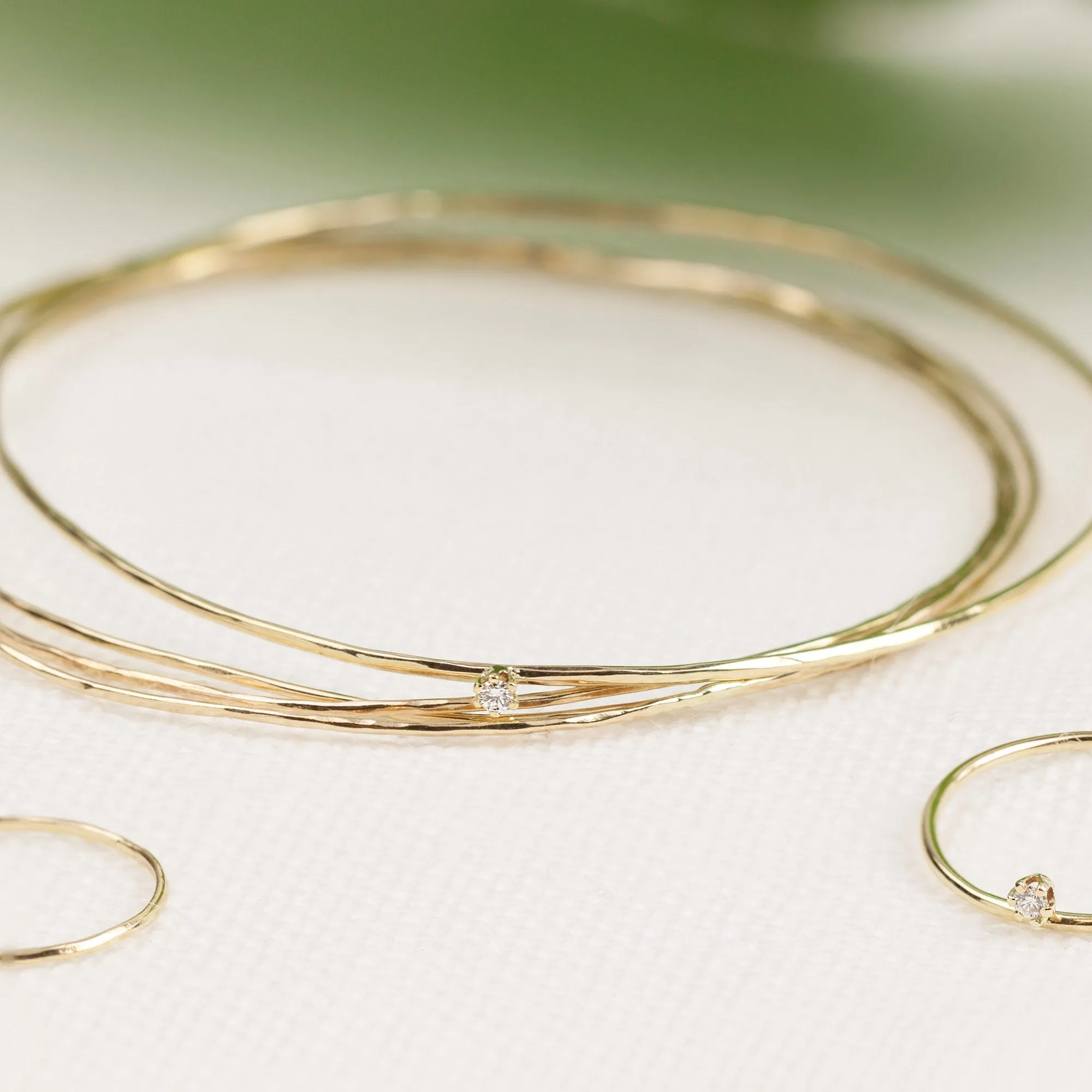 Gold Streaks Hammered Bangle with Diamond