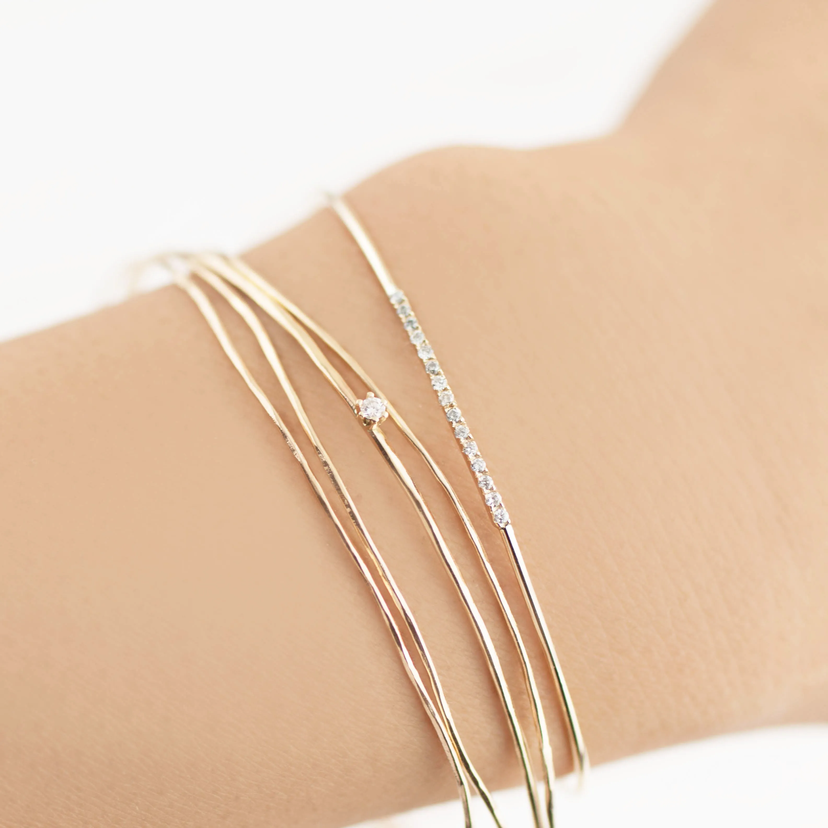 Gold Streaks Hammered Bangle with Diamond