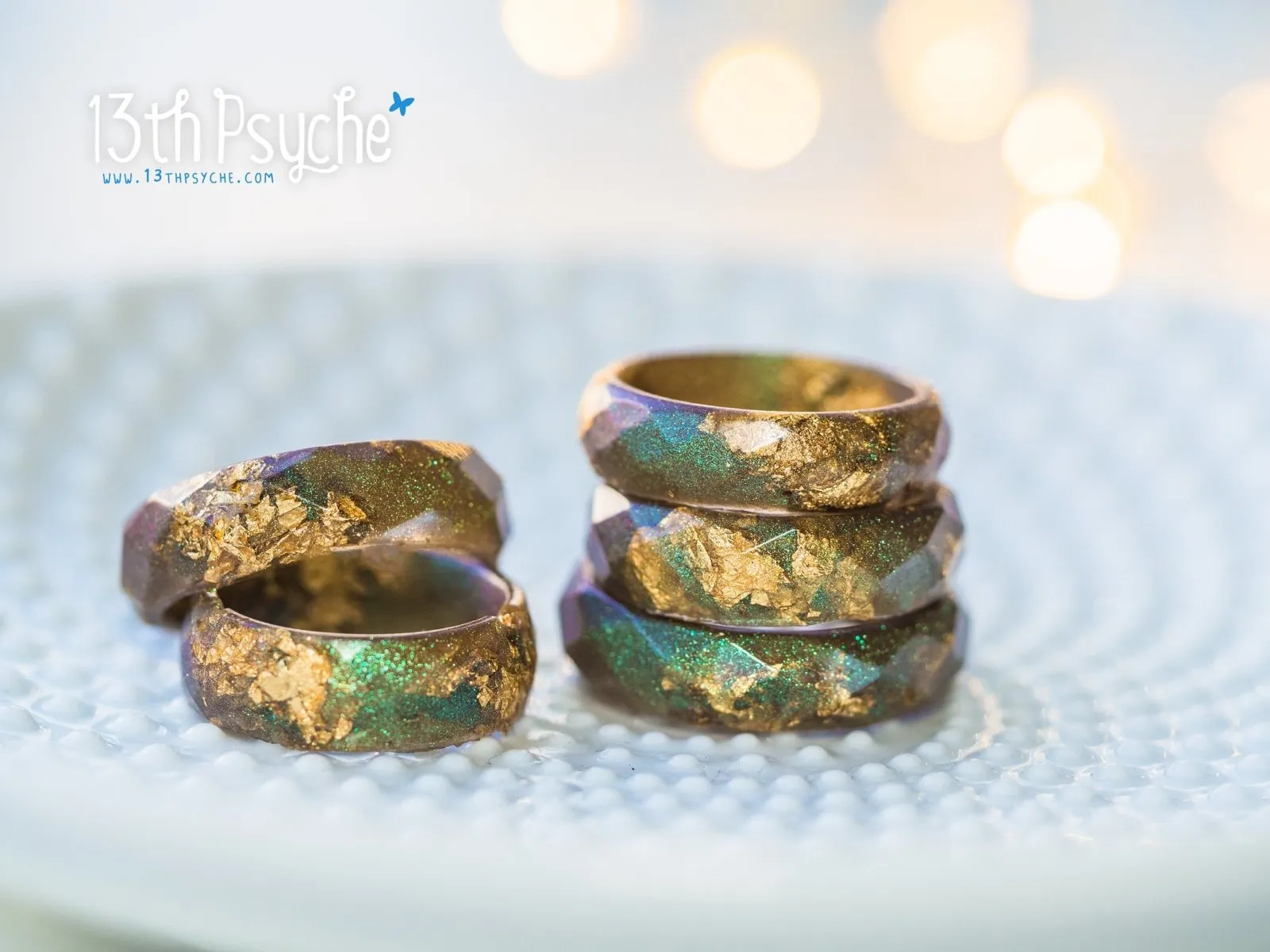 Iridescent green faceted resin ring with gold flakes