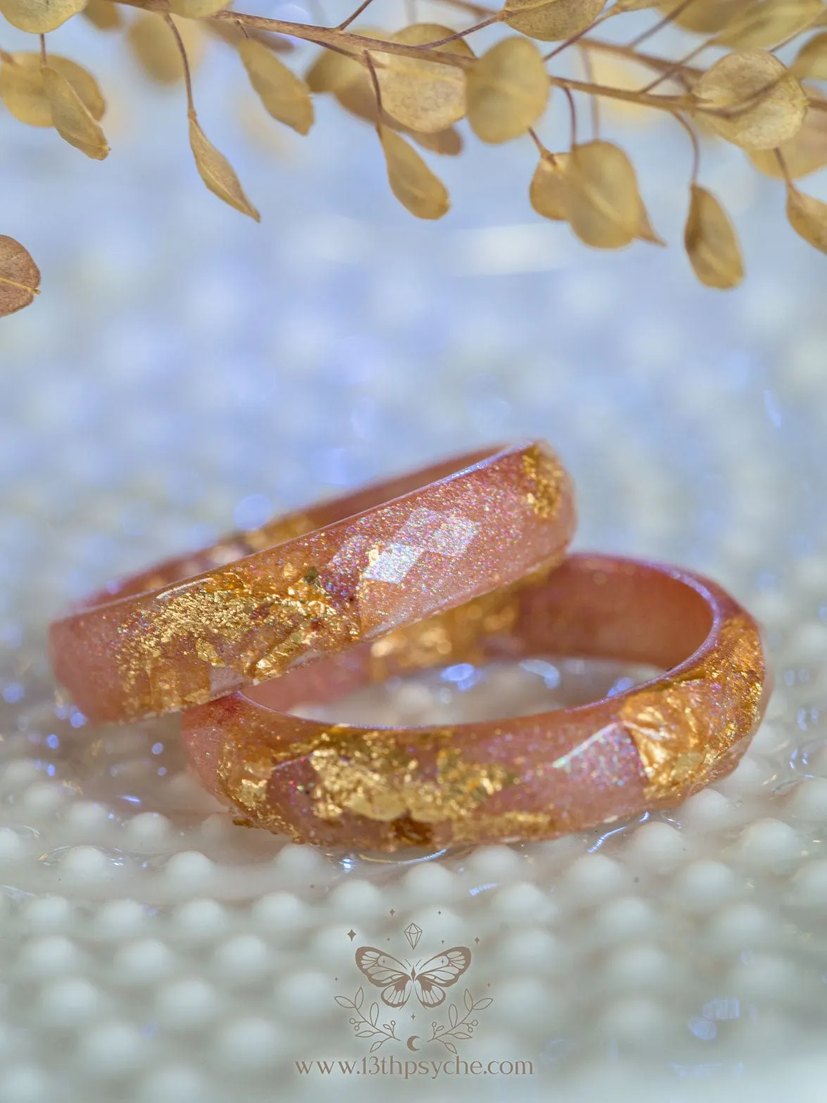 Iridescent pink faceted resin ring with gold metal flakes