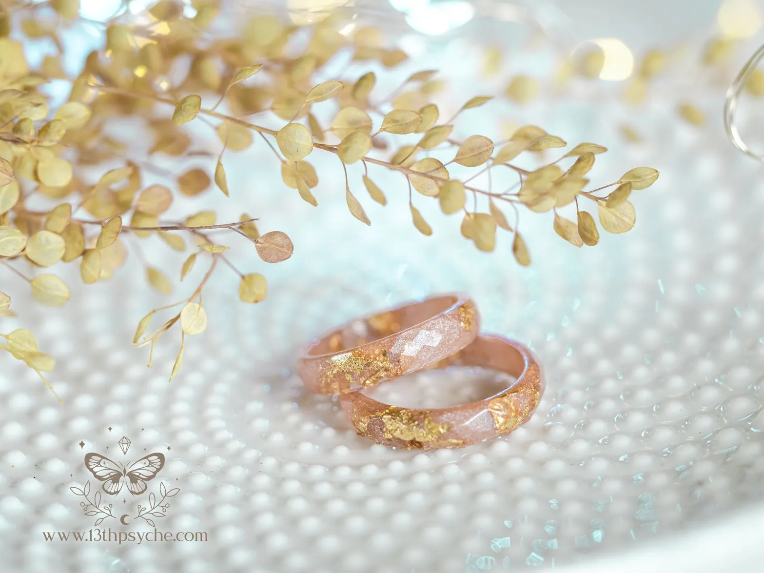 Iridescent pink faceted resin ring with gold metal flakes