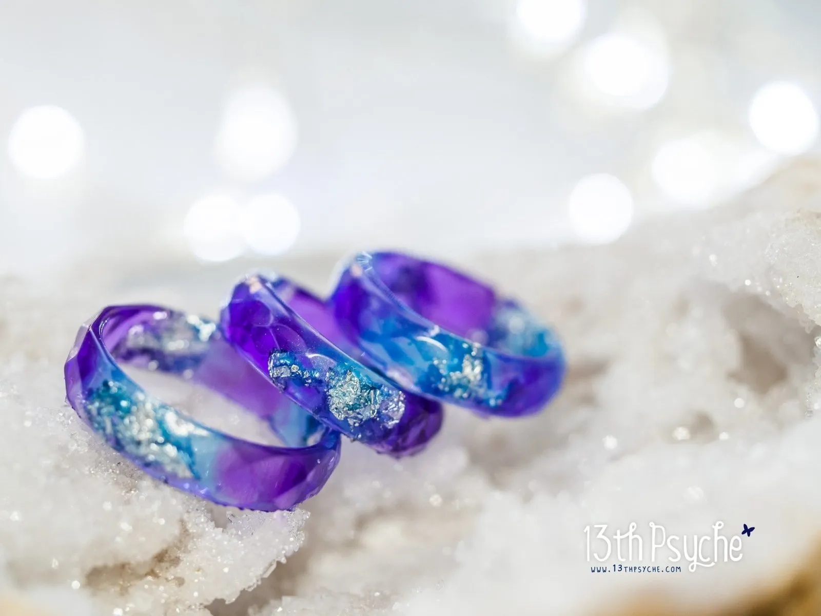 Purple and blue faceted resin ring with silver flakes